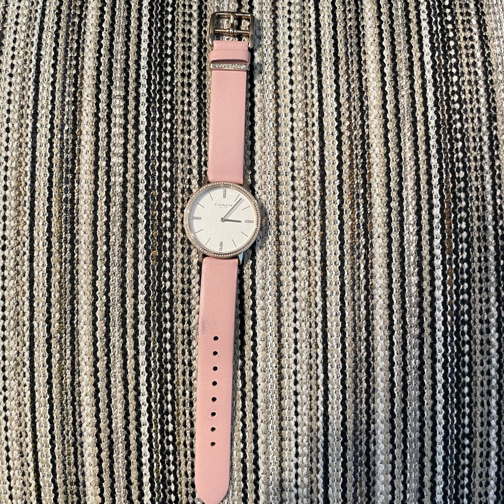 Pink women’s Coach leather band watch with crystal accents 👀